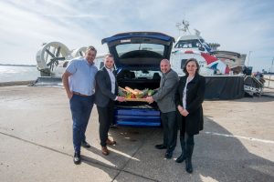 Partners of Southsea Food Festival unloading a Lexus with food
